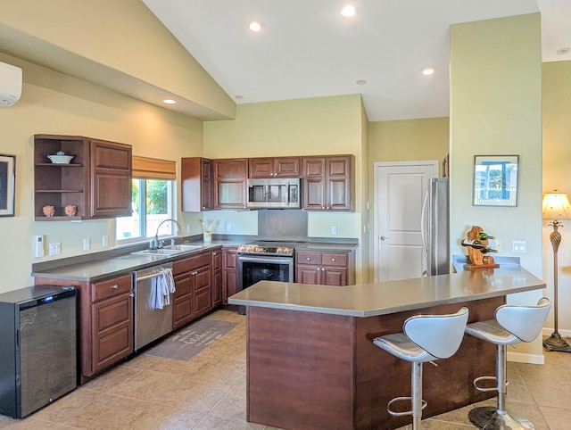 kitchen featuring light tile patterned flooring, high vaulted ceiling, stainless steel appliances, and sink