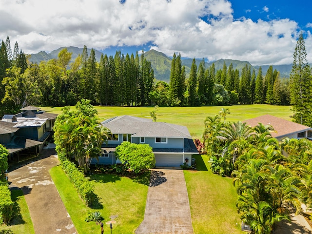 birds eye view of property featuring a mountain view