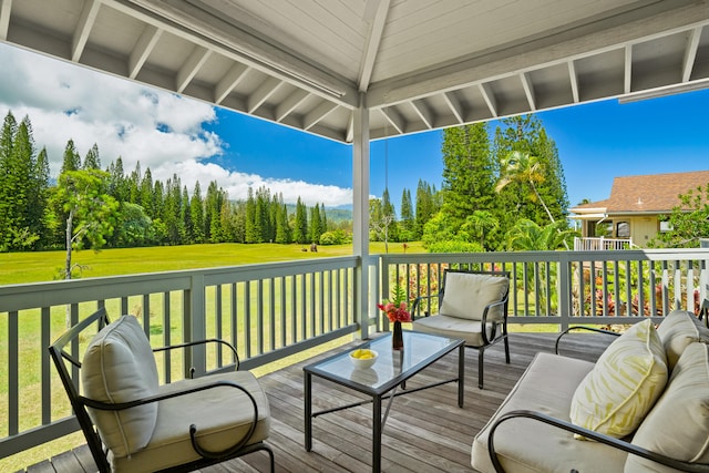 deck with a gazebo and a lawn