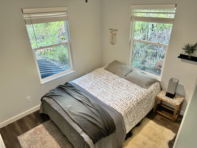 bedroom with light hardwood / wood-style flooring