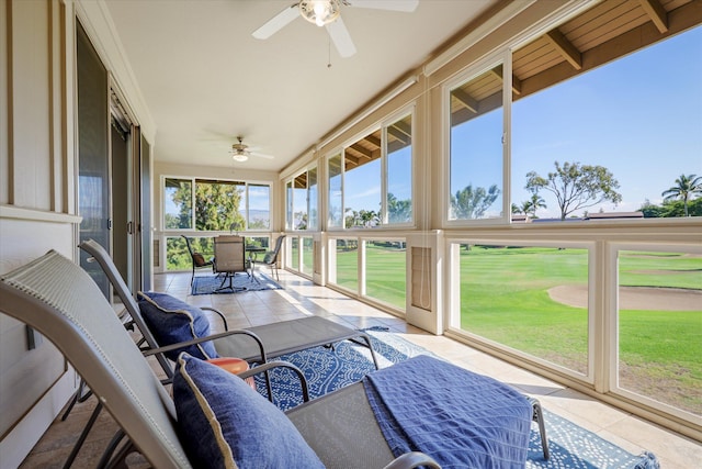 sunroom / solarium with ceiling fan