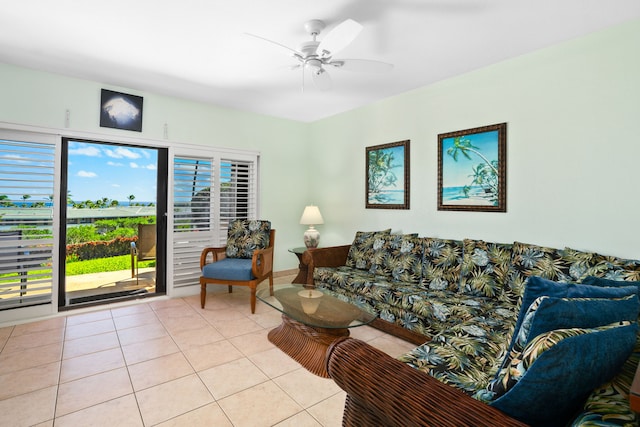 tiled living room featuring ceiling fan