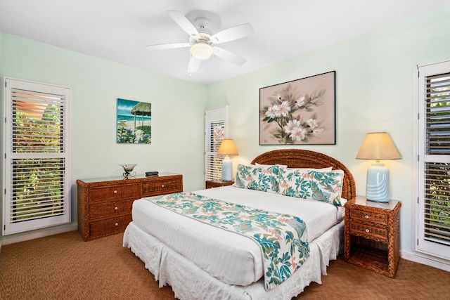 bedroom with ceiling fan and carpet flooring