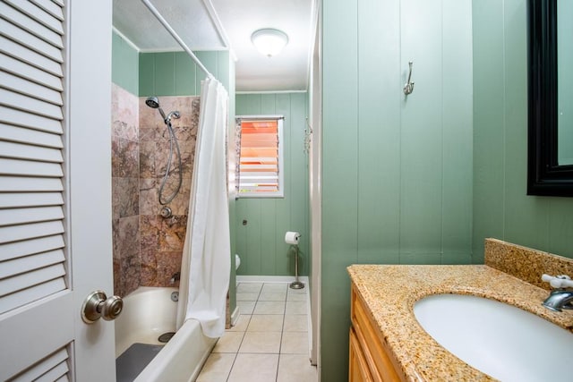 bathroom featuring shower / bath combination with curtain, vanity, wooden walls, and tile patterned flooring