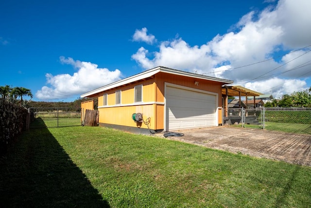 view of property exterior with a garage and a lawn