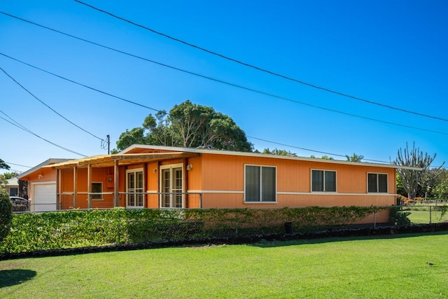 view of home's exterior with a lawn