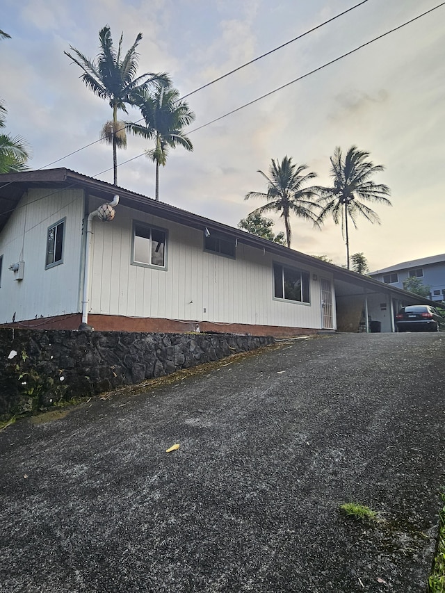 view of property exterior at dusk