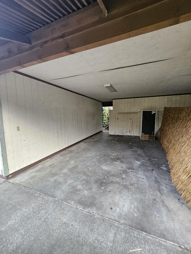 garage with wood walls