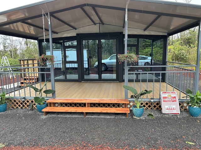 exterior space featuring a carport and french doors