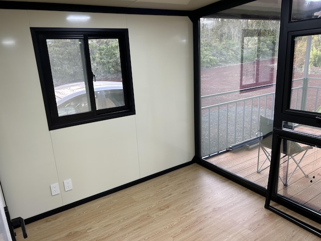 unfurnished sunroom with plenty of natural light