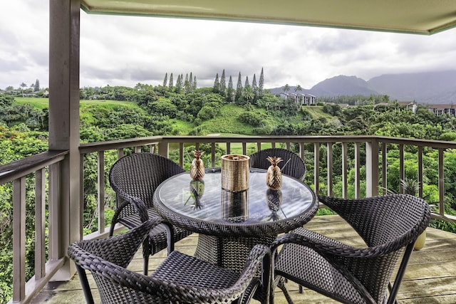 balcony with a deck with mountain view