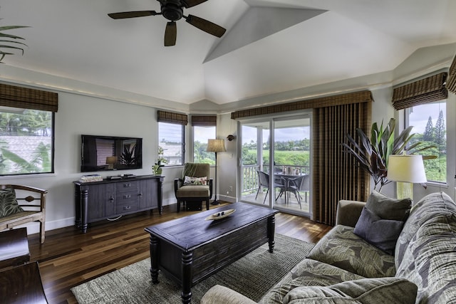 living room featuring ceiling fan, lofted ceiling, and dark hardwood / wood-style flooring