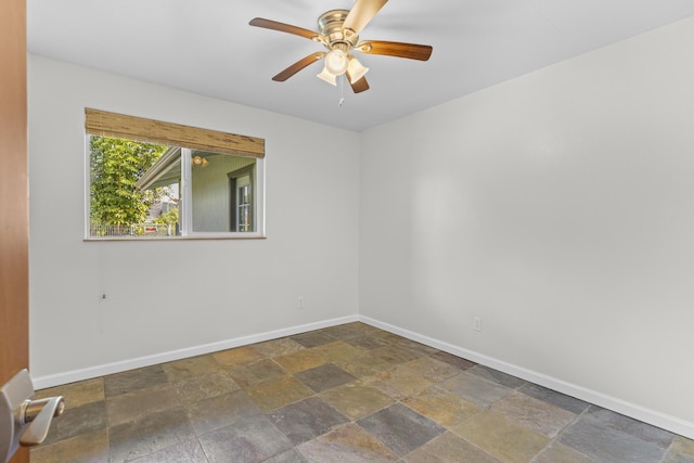 unfurnished room featuring ceiling fan