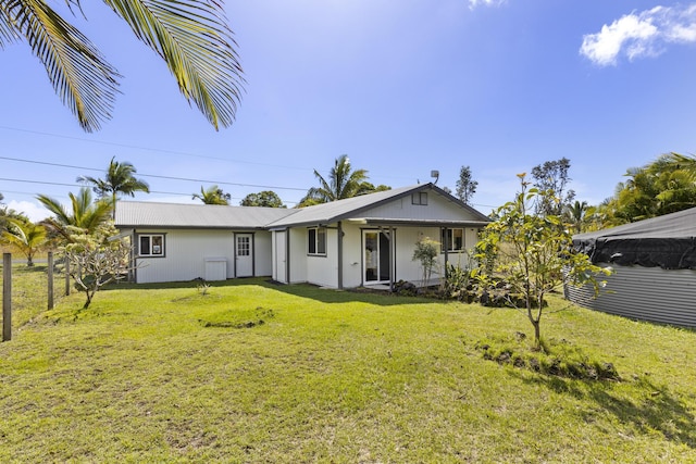 ranch-style home with a front yard