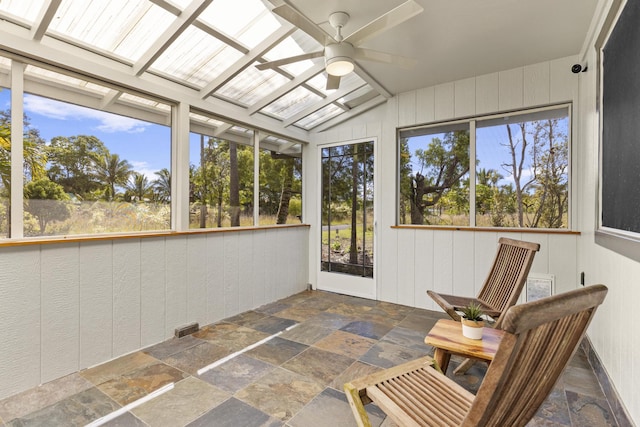 sunroom with vaulted ceiling and ceiling fan