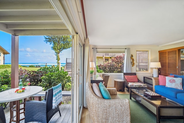 sunroom with a water view