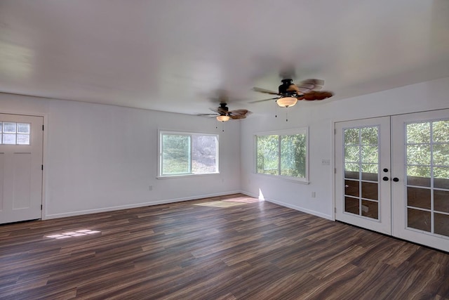 interior space with dark hardwood / wood-style flooring, french doors, and ceiling fan