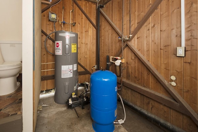 utility room featuring electric water heater