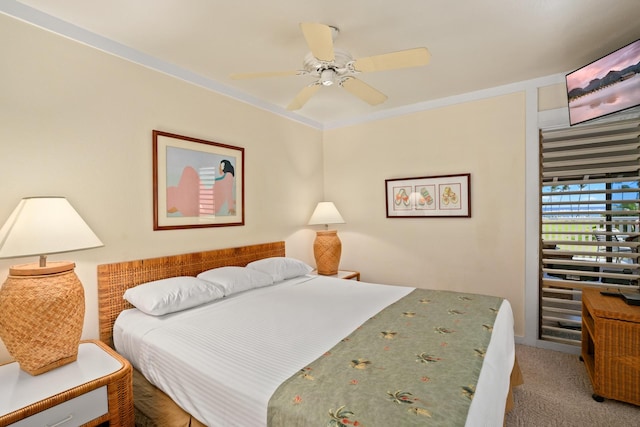 bedroom with ceiling fan and carpet flooring