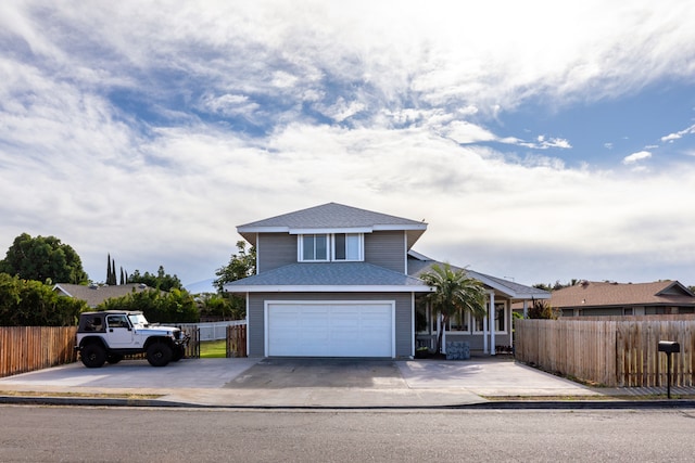 view of front of property with a garage