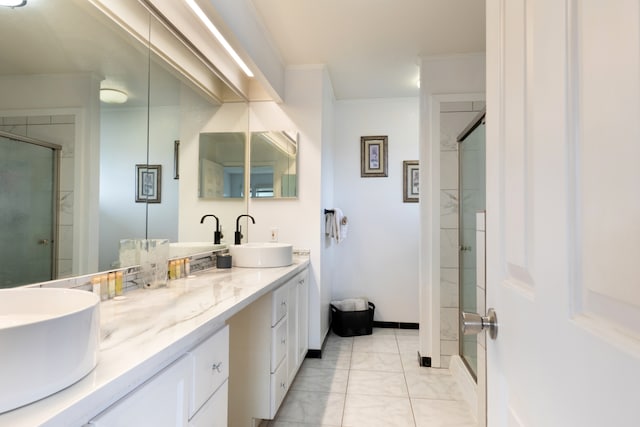 bathroom with a shower with door, crown molding, and vanity