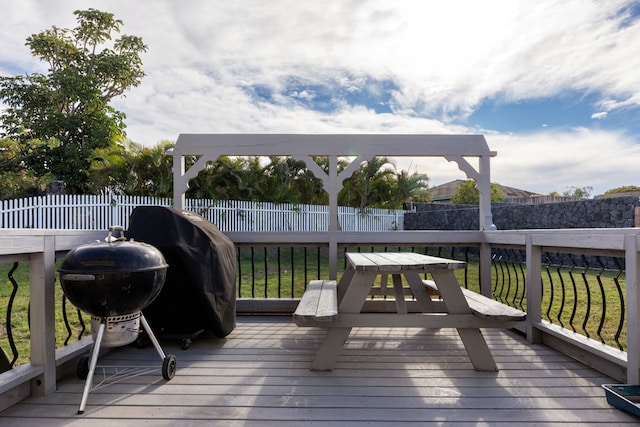 wooden terrace with area for grilling