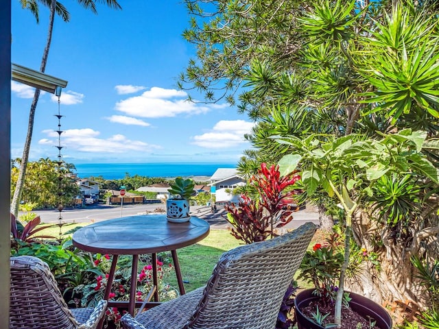 balcony featuring a water view