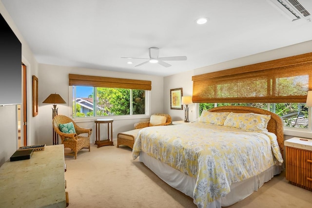 carpeted bedroom with ceiling fan