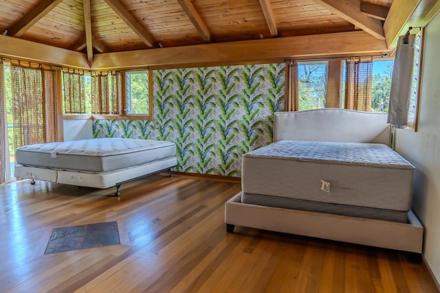 bedroom featuring wood-type flooring, wooden ceiling, and lofted ceiling with beams