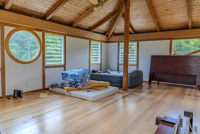 bedroom with wood ceiling, vaulted ceiling with beams, and light hardwood / wood-style floors