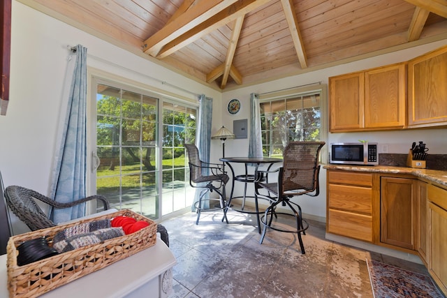 kitchen featuring wooden ceiling and vaulted ceiling with beams