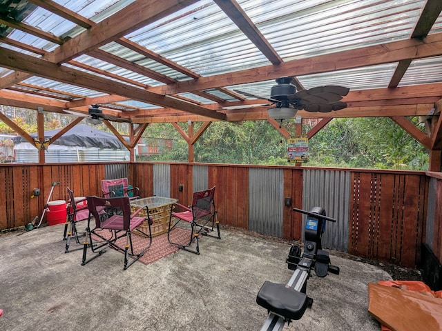 view of patio featuring ceiling fan and a pergola