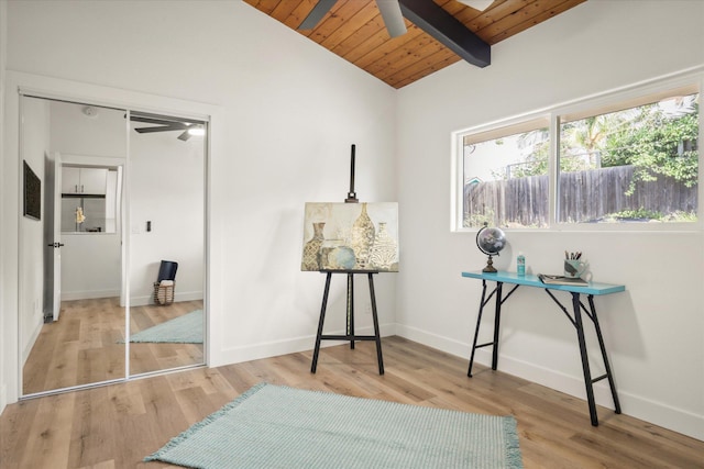 miscellaneous room with wood ceiling, lofted ceiling with beams, ceiling fan, and light wood-type flooring