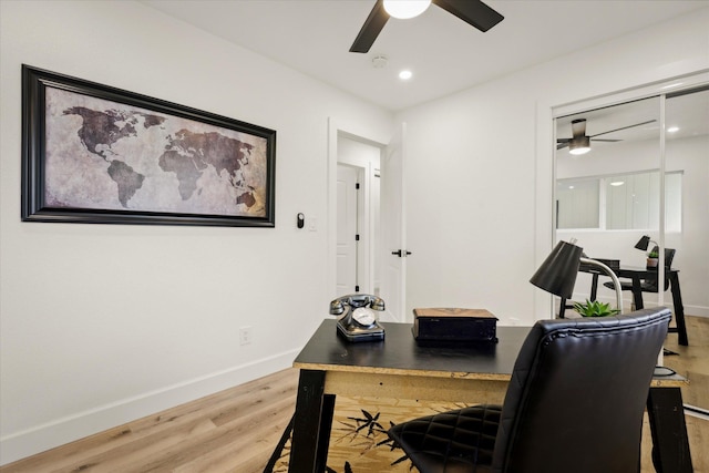 office area featuring hardwood / wood-style flooring and ceiling fan