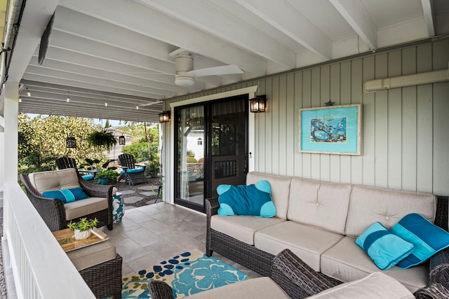 view of patio / terrace with an outdoor living space and ceiling fan