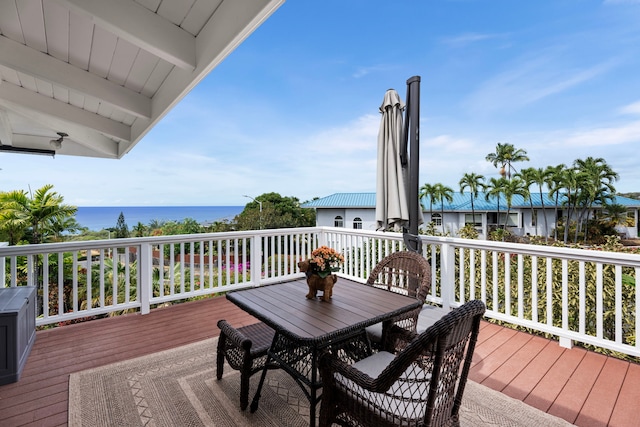 wooden terrace with a water view