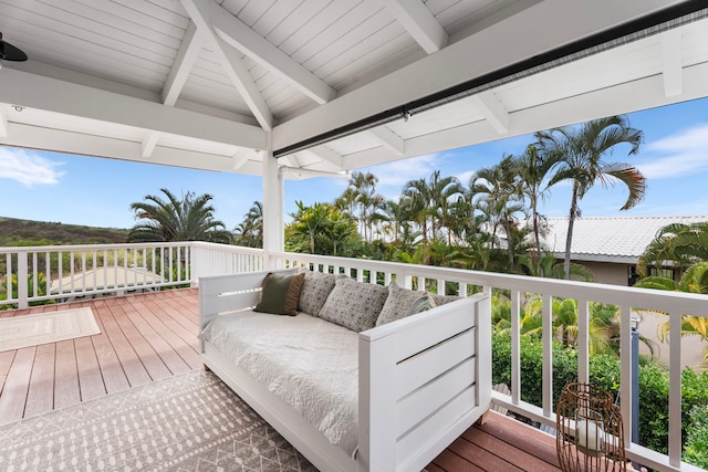 wooden terrace featuring an outdoor hangout area