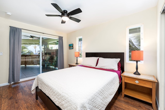 bedroom with dark hardwood / wood-style floors, ceiling fan, and access to exterior