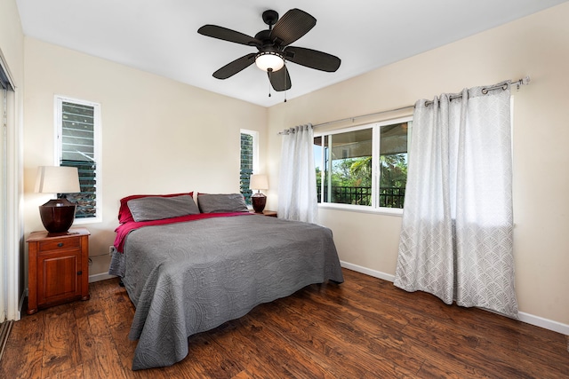 bedroom featuring dark wood-type flooring and ceiling fan