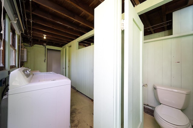 laundry area with independent washer and dryer