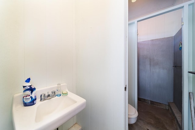 bathroom with sink and toilet