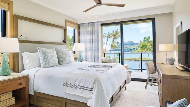 carpeted bedroom featuring ceiling fan, ornamental molding, and access to outside