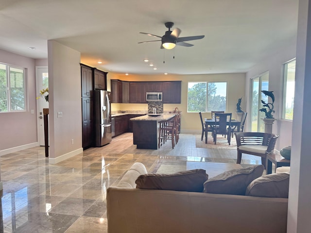 living room with ceiling fan