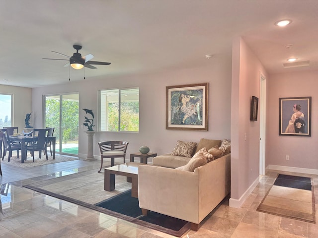 living room with ceiling fan