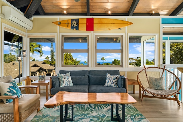 sunroom with an AC wall unit, beamed ceiling, and wood ceiling