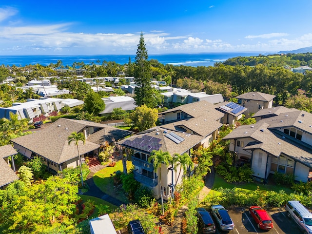 bird's eye view with a water view and a residential view