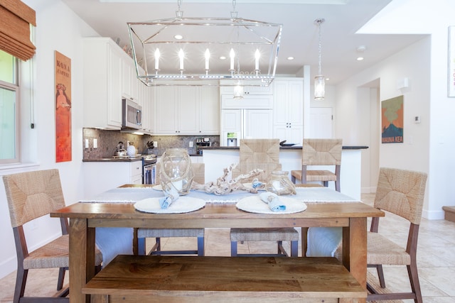 dining space with light tile patterned floors