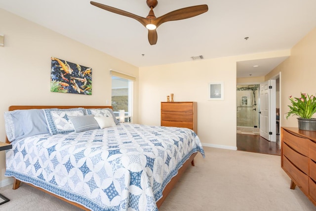 carpeted bedroom with ceiling fan