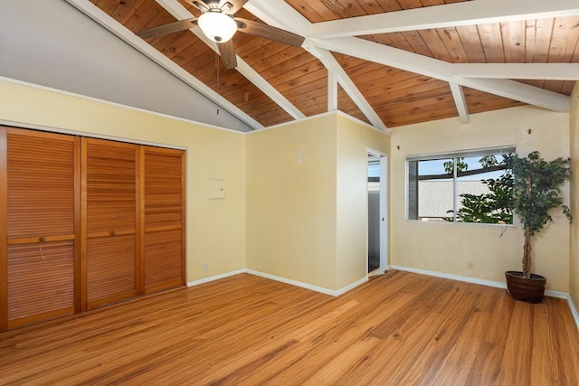 unfurnished bedroom with wood ceiling, lofted ceiling with beams, a closet, and light wood-type flooring