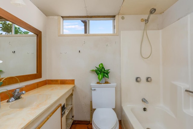 full bathroom with vanity, toilet, and shower / washtub combination